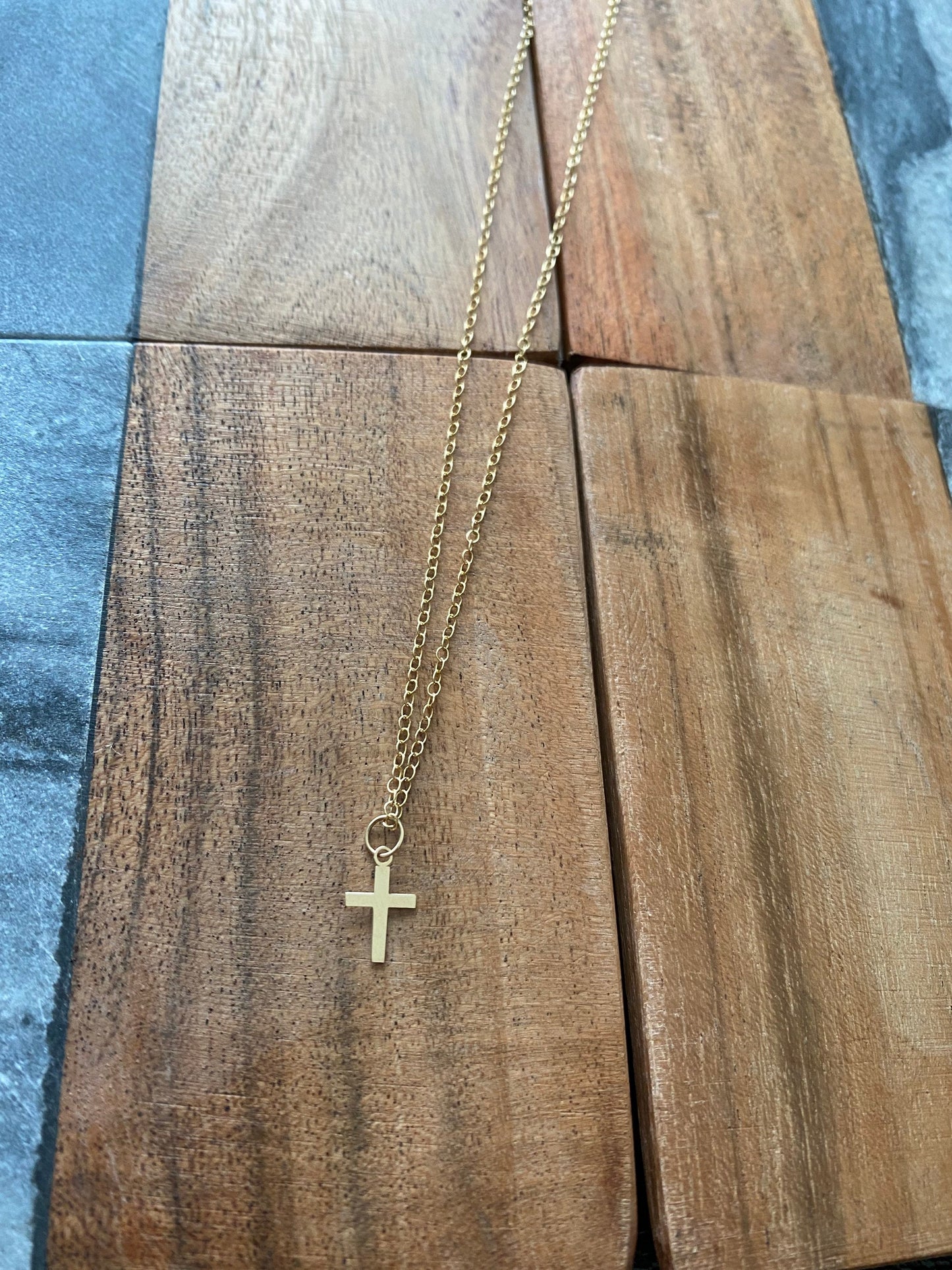 Tiny 14k gold cross necklace