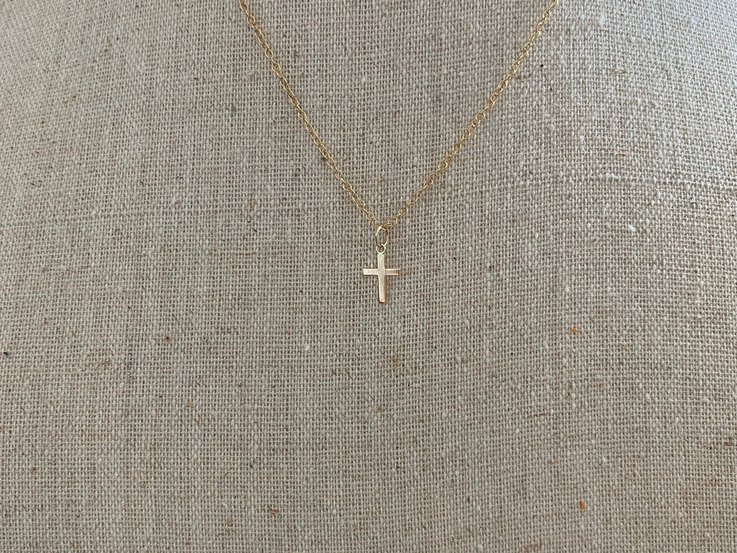 Tiny 14k gold cross necklace