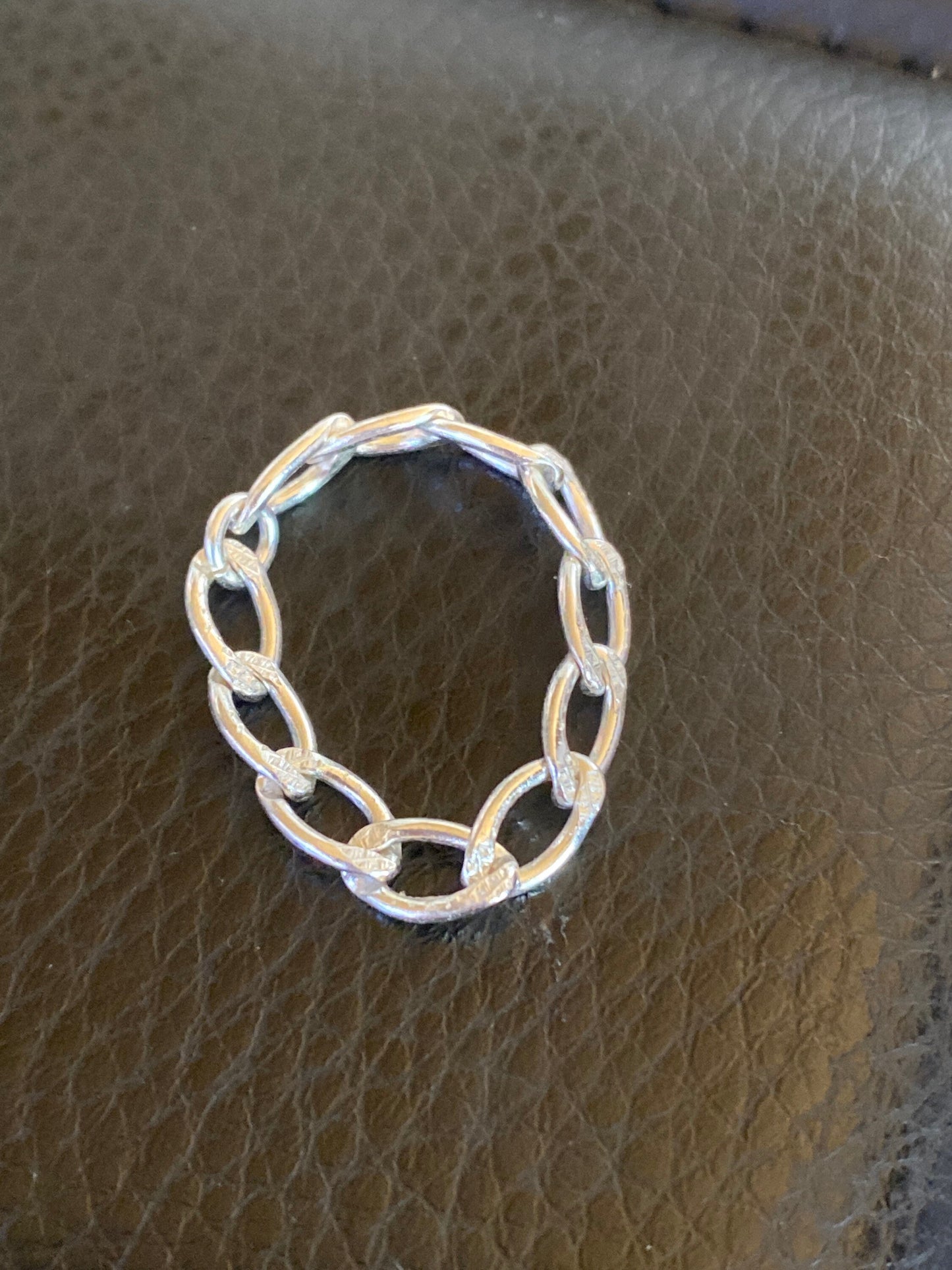 Curb chain ring