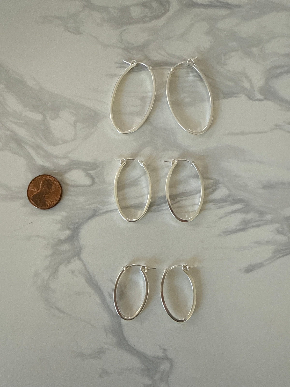 Oval shaped hoop earrings
