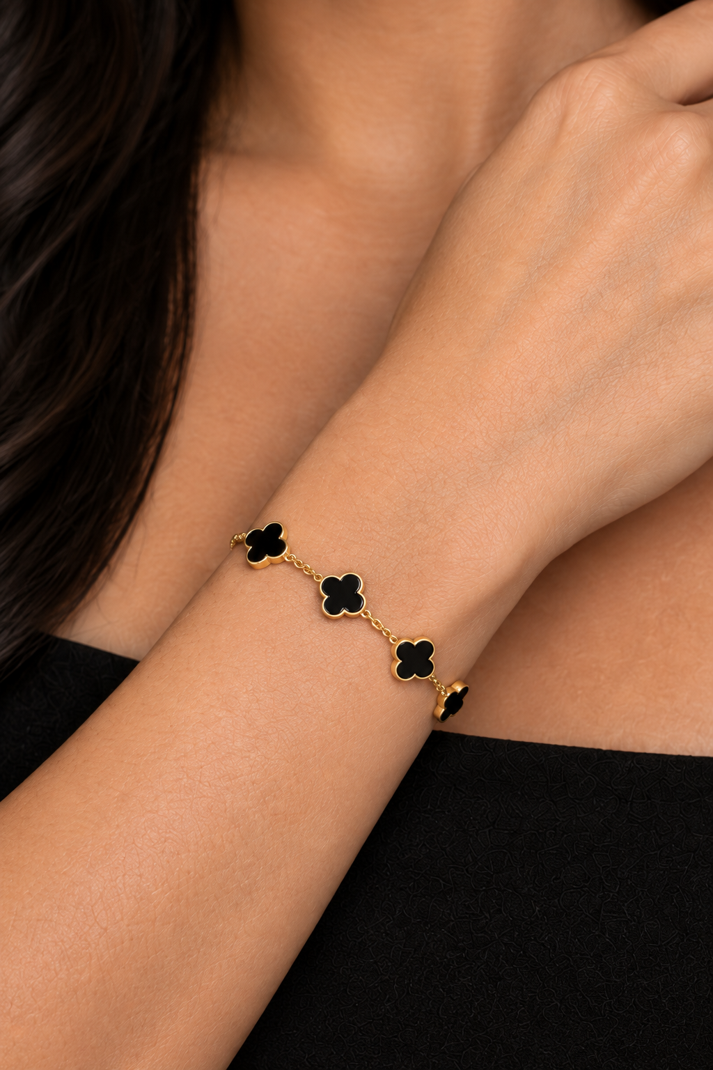 Close-up of the black and gold bracelet