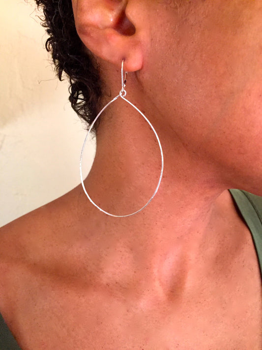 Large dangle tear drop hammered hoops