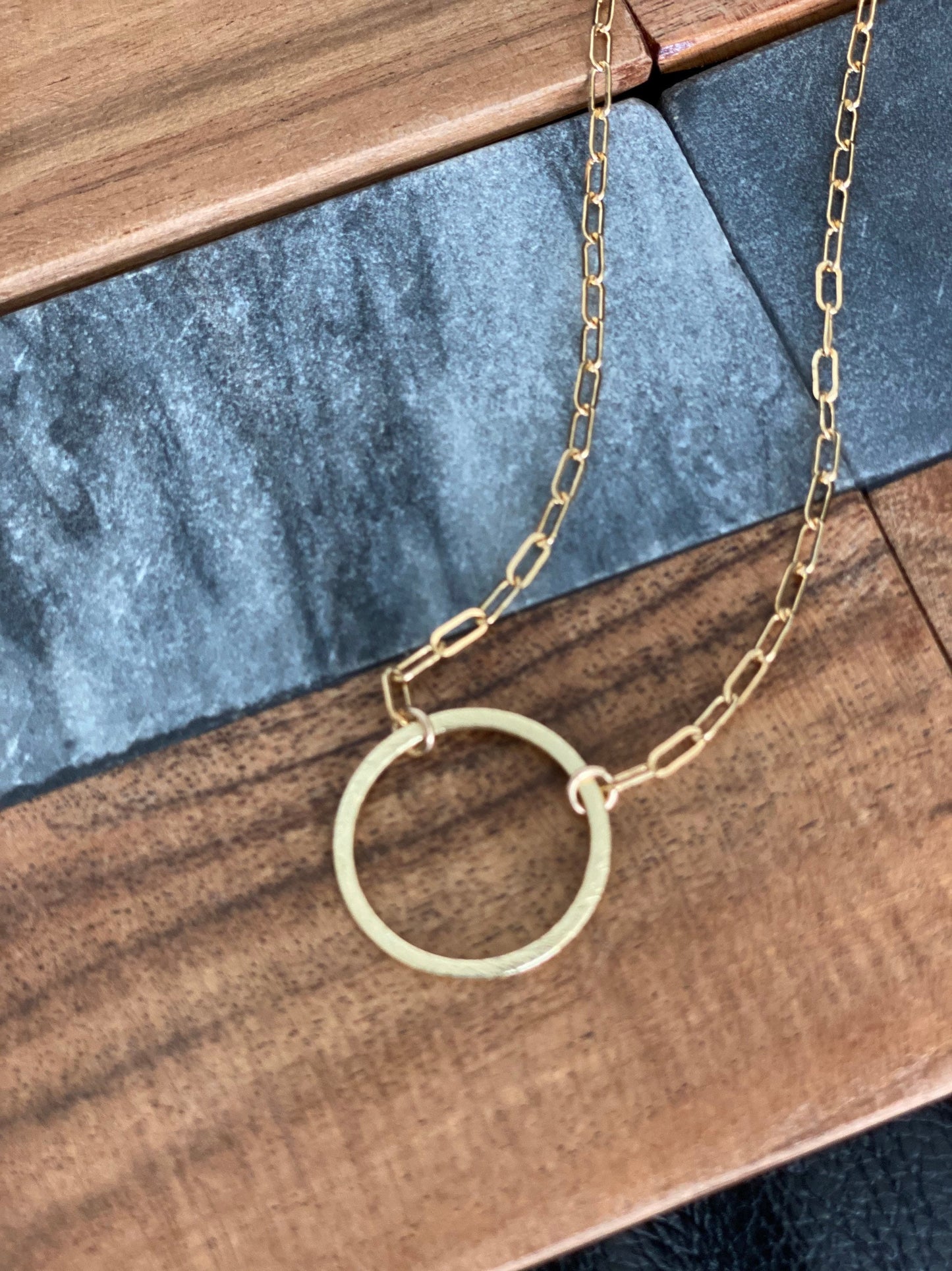 Circle pendant with small paper clip chain necklace